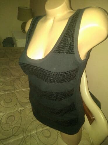 tank top h m: Crna majca. L vel. Presijava
Fixna cena — 4
