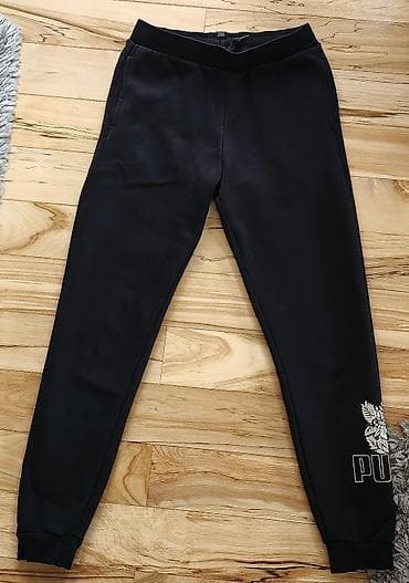 nike velicine odece za decu: Puma trenerke za devojcice– crne, sa printom, vel 13/14 - Model — 1