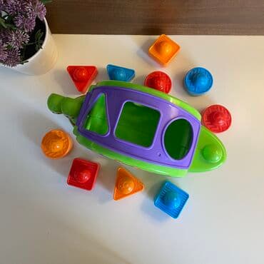 volan igracka za decu: Fisher Price muzicki interaktivni puz sa kockama razlicitog oblika — 4