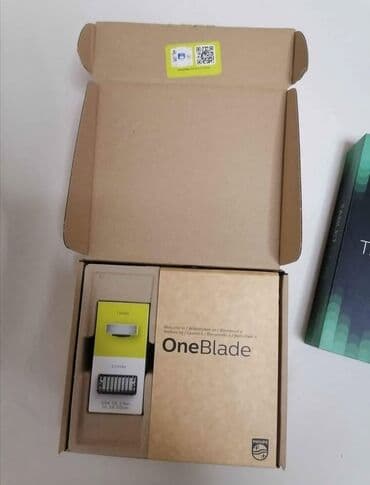 aparati online besplatno: Philips OneBlade trimer u crnoj boji sa žutim akcentima, dizajniran za — 2