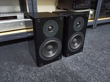 Foto i video kamere: Yamaha NX-E 100 Type: 2 way, 2 driver loudspeaker system Frequency — 3