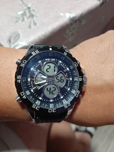 satovi telefoni: Sat Werde original ispravan sat je ocuvan kao nov stanje se vidi i na — 1