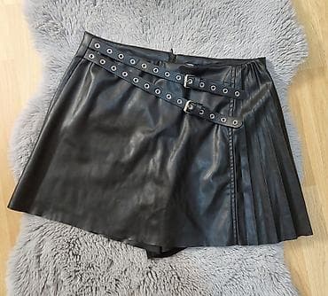 kožna suknja: Crne kožne šorts-suknja (skort) sa kaiševima i plise detaljem - — 1