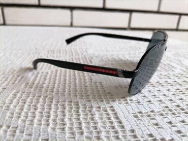 top coat: Sunglasses, Prada — 1