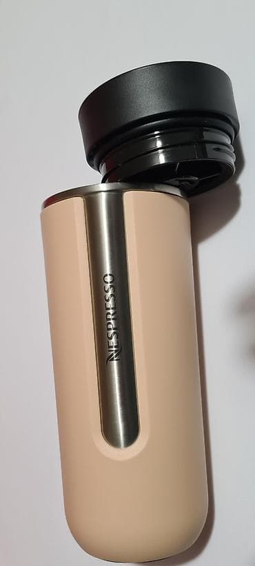 kante za smece: Nespresso Nomad termo putna šolja u krem boji.  - Materijal: Nerđajući — 4