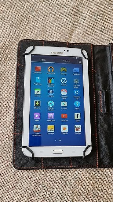 desktop ventilator: Kožna futrola sa ugrađenom žičnom tastaturom za tablet (oko 7–8 inča) — 6