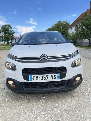 lidl kompresor za vazduh: Beli automobil marke Citroen C3 sa crnom maskom hladnjaka i crnim — 1