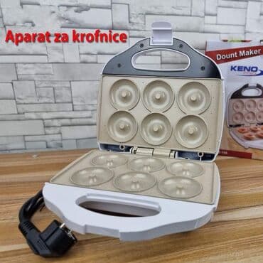 Aparat za krofnice Cena 2950 dinara+Ptt 350 dinara. Garancija 24