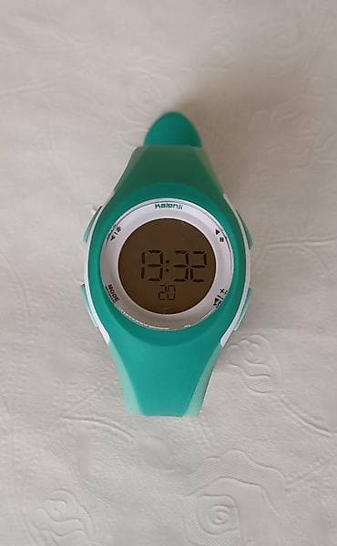 Sportski sat Decathlon Kalenji w200 s ženski model. Boja pastelno