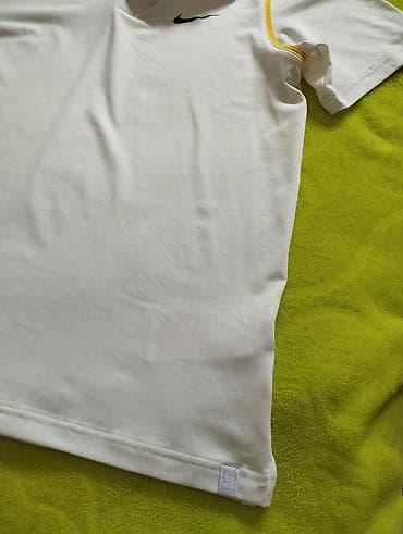 lutke sa kosom: Original.Nike majca sa slika. Jednom nosena.Nike Dri-FIT polo majica — 4