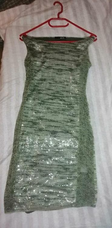 Zelena ženska haljina bez rukava, uskog kroja (bodycon), dužine do