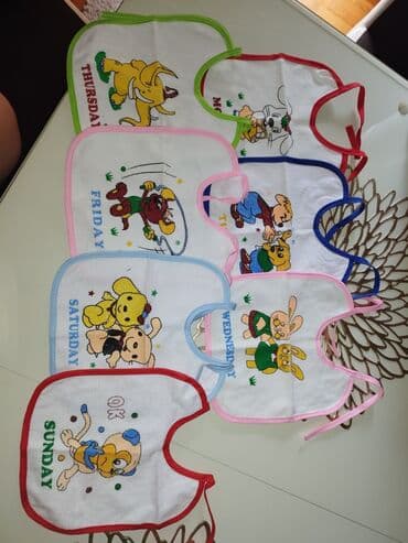 gimnastika za bebe lidl: Set podbradnika za bebe – 7 komada, za svaki dan u nedelji. - — 1