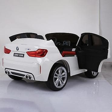 Dvosed BMW X6 M – beli auto na akumulator za decu Šifra proizvoda