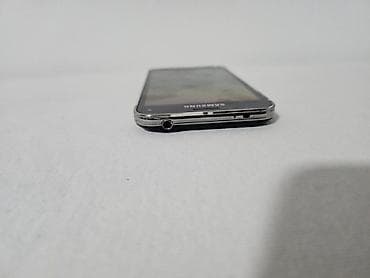 pixi 4: Na prodaju Samsung Galaxy S5 mini u crnoj boji. Telefon je fizički — 2
