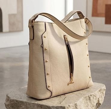 torba christian dior cena: Elegantna ženska torba od bež/ekru eko-kože sa zrnastom teksturom — 1