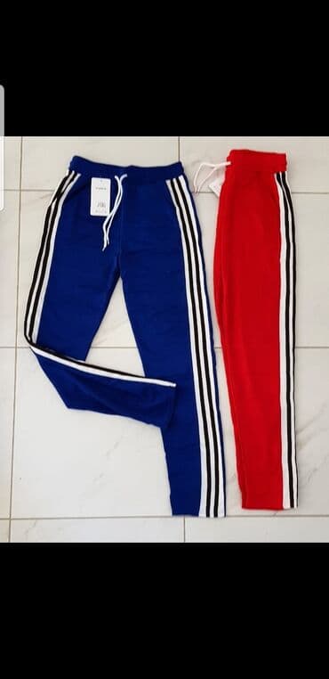 svecane pantalone i bluze: Trenerke nove 
Plava i crvena
Po 700din 
M L Xl
Imaju elastina — 1
