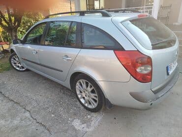 kuciste kljuca opel corsa c: Renault Laguna karavan, srebrne boje, sa krovnim nosačima. Poseduje — 1