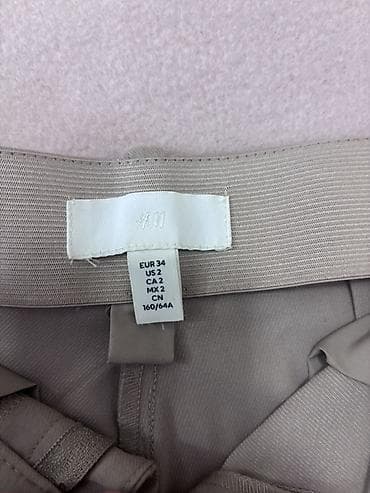 nike farmerke: Ženske elegantne pantalone cigaret kroja Velicina vise odgovara 32 — 4