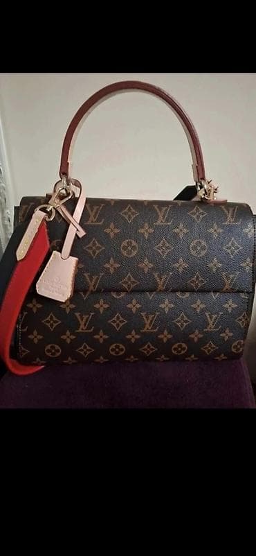 torbe lacoste: Elegantna ženska torba sa preklopom u klasičnom monogram printu. - — 1