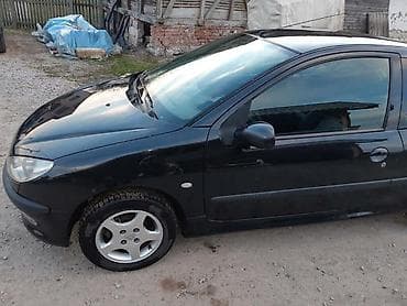 VRATA ZA PEUGEOT 206 | Kompletna vrata u crnoj boji.Imam sve delove