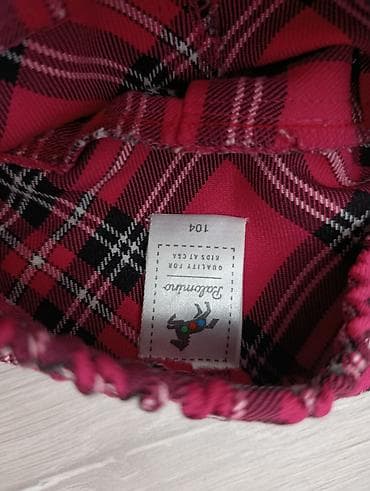 zara tunike kosulje: Dve dečije suknje – veličine približno 9–10 godina. 1) Karirana — 2