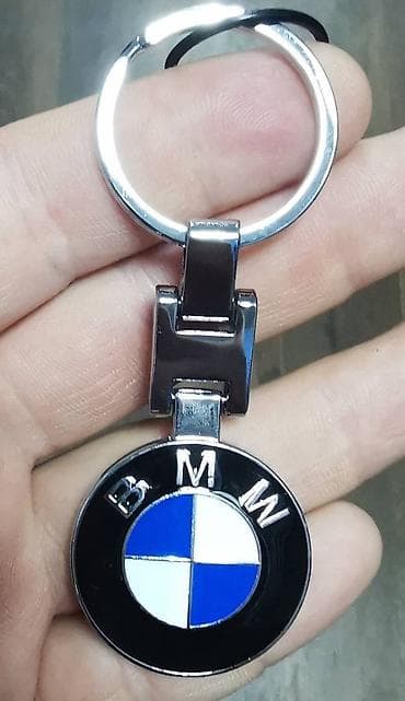 Privezak za kljuceve automobila,metalni. Novo,nekorisceno. Kontakt