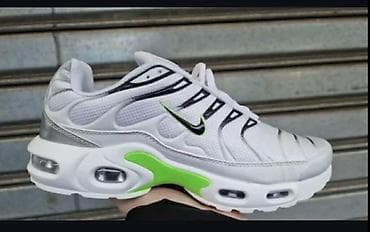 Nike Air Max patike – bele sa crnim detaljima i neon zelenim akcentima