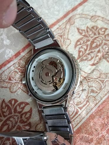 calypso satovi: TCM chronograph - automatic Sat radi, posle 8-10 sati pracenja — 7