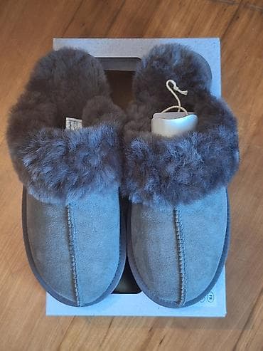 Papuce zenske kozne sa jagnecim krznom.Poput Ugg.Nemacki brend.Jako