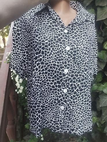 Košulje: Doris kosulja vel L,XL rasprodaja 
Duzina 64
Pazuh po 60 — 2