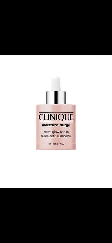 Donji delovi trenerke: Clinique Moisture Surge Active Glow Serum Opis: - Serum za lice sa — 1