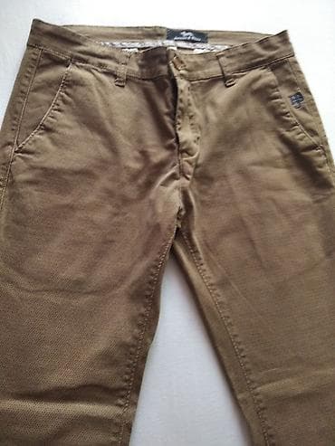 kozne pantalone hm: Muške chino pantalone, bež/kaki boje, ravnog užeg kroja. - Materijal — 1