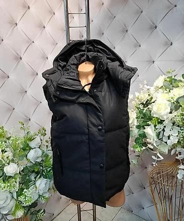 hummel jakne: Zimski ženski prsluk sa kapuljačom - Topao, prošiven model sa — 2