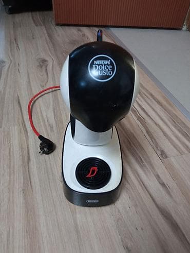 Nescafé Dolce Gusto aparat za kafu (De’Longhi) - Kompaktan kapsulni na lalafo.rs Nescafé Dolce Gusto aparat za kafu (De’Longhi) - Kompaktan kapsulni