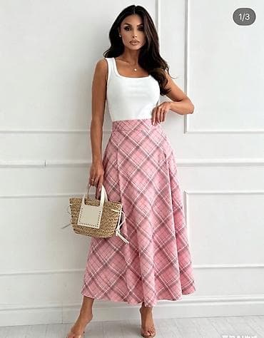 novogodisnje suknje: ✅Ženska midi suknja na A-kroj sa kariranim dezenom
✅2400 din 
S M L — 1