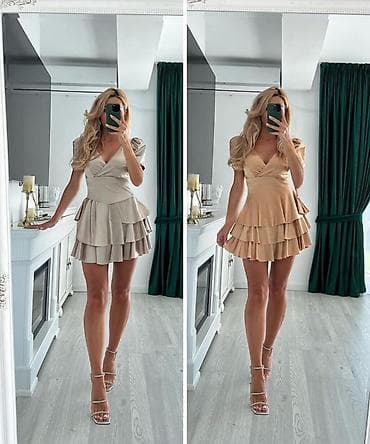 Blazers: Saten mini haljina sa volanima
Po super ceni 1999 din 
One size — 7