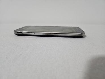 pixi 4: Na prodaju Samsung Galaxy S5 mini u crnoj boji. Telefon je fizički — 6