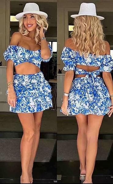 versace dylan blue zenski set: Dvodijelni ženski set – top i mini suknja s volanima
3300 din
S M L — 2