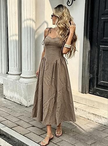 second hand svecane haljine: Letnja midi haljina sa bretelama na vezivanje
2300 din 
S M L — 8
