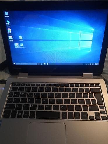 Toshiba

ekran osetljiv na dodir, ide i punjac