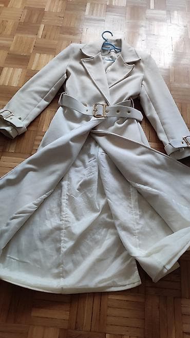 Muška odeća: Elegantni ženski kaput sa pojasom – boja slonovače (krem/bela). - — 4