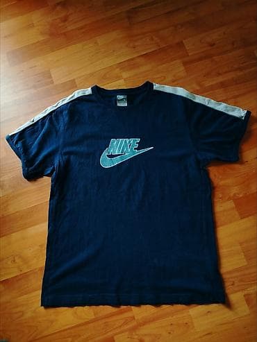 teget boja kombinacije: NIKE TEGET Muška Majica L Original
Stanje Extra, RETRO MODEL
VRH PAMUK — 1