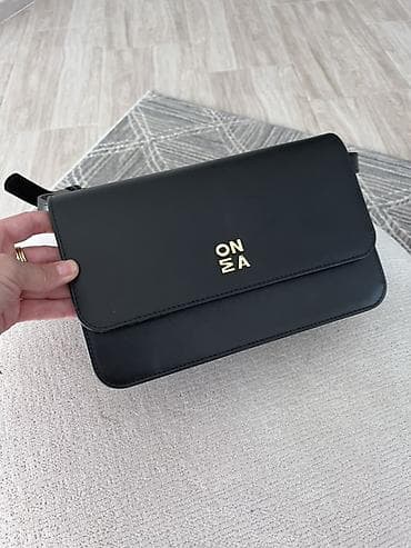 Mona Elegantna crna ženska torba preko ramena - Minimalistički dizajn na lalafo.rs Mona Elegantna crna ženska torba preko ramena - Minimalistički dizajn