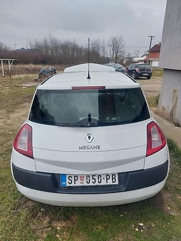Prodaja automobila: Renault Mégane II, bele boje, hečbek sa 5 vrata. Pogonsko rešenje sa — 7