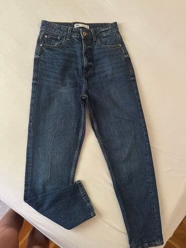 Farmerke: Ženske farmerke tamnoplave boje, klasičnog dizajna sa pet džepova na lalafo.rs Farmerke: Ženske farmerke tamnoplave boje, klasičnog dizajna sa pet džepova