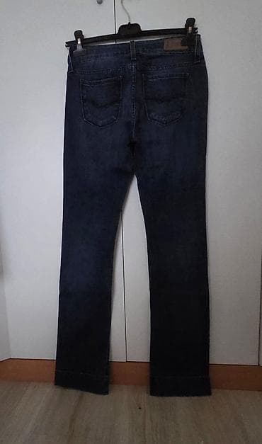 pantalone zlatne: Ženske farmerke, tamno plave (indigo) boje, klasičan kroj sa ravnom — 1