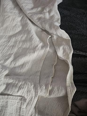 Haljine: Stradivarius haljina bez rukava, bež/ekru boje. Model sa izrezom u — 3