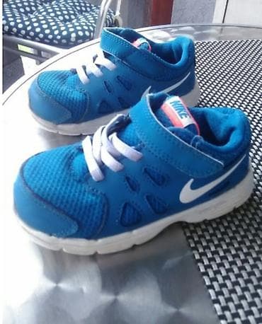 polovna odeca za bebe: Dečije patike Nike, plave boje sa belim đonom i logotipom sa strane — 1