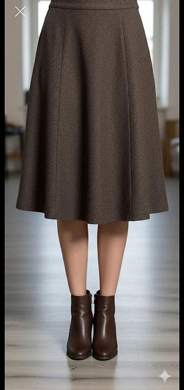 Ženska midi suknja A-kroja u tamno braon boji. Kroj sa prijatnim padom