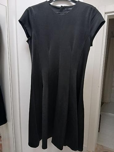 Pantalone, Farmerke, Šortsevi: Crna ženska haljina A‑kroja - Boja: crna - Kroj: blago strukiran — 3